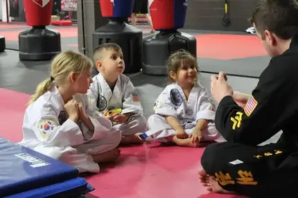 Kids training martial arts as part of after school physical education at GMA